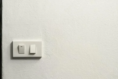 Concrete wall with electric switch Stock Photos