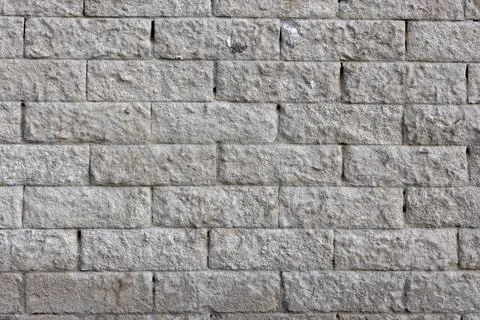 Concrete wall with geometric pattern for use as a background texture Stock Photos