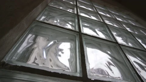 Concrete wall with glass block window Stock Footage 158567307