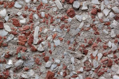 Concrete wall. Lining from broken brick. Used as a background. Stock Photos