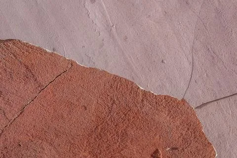 Concrete wall with old plaster chipped, texture background Stock Photos