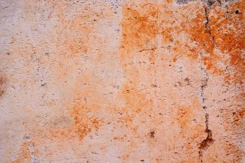 Concrete wall with orange spots Stock Photos