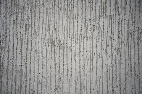 Concrete wall with a pattern. Geometry. Background, texture. Stock Photos