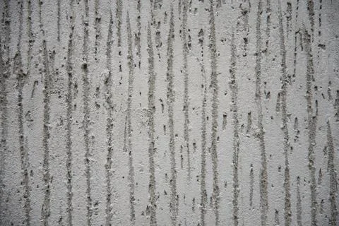 Concrete wall with a pattern. Geometry. Background, texture. Stock Photos