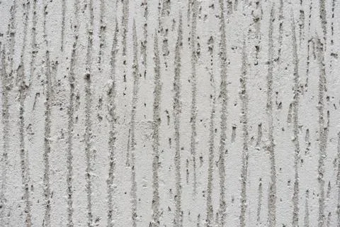 Concrete wall with a pattern. Geometry. Background, texture. Stock Photos