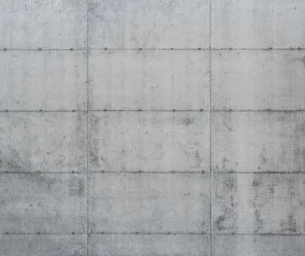 Concrete wall separated into blocks Stock Photos