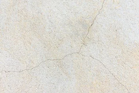 Concrete wall texture with crack close up Stock Photos