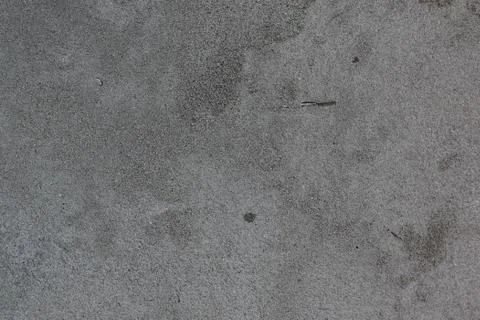 Concrete wall texture gray background close-up without people Stock Photos