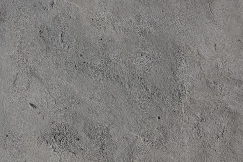 Concrete wall texture gray background close-up without people Stock Photos