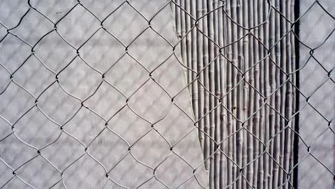 Concrete wall texture with mesh Stock Photos