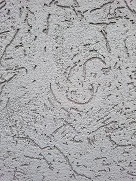 Concrete wall texture shows abstract patterns on a surface with unique desi.. Fotos Stock