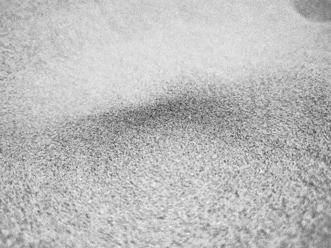 Concrete wall texture with subtle pattern and soft lighting Stock Photos
