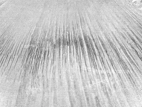 Concrete wall texture with thin vertical scratches and gray tones Stock Photos