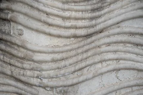 Concrete wave pattern creating an abstract background texture with horizontal Stock Photos