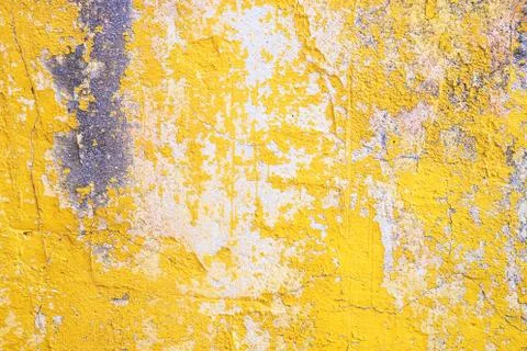 Concrete yellow colorful wall surface texture. Abstract grunge bright color Stock Photos