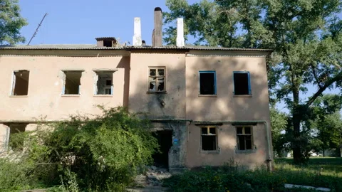 Condemned building. An empty old multi-storey house to be demolished. 4K Stock Footage 106723075