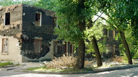 Condemned building. An empty old multi-storey house to be demolished. 4K Stock Footage 106724736