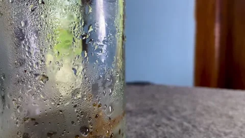 Condensation on Glass Cup Close Up Stock Footage 325646992