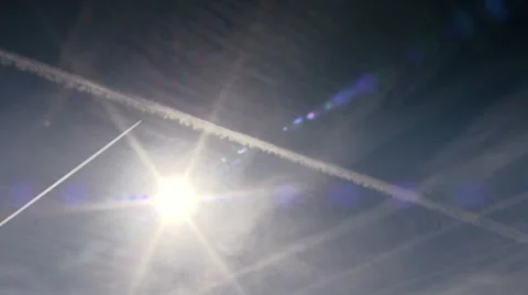 Condensation trails behind a plane. 動画素材 8686825