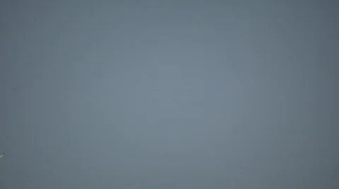 Condensation trails left behind from a passing airplane (High Definition) Stock Footage 67786