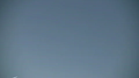 Condensation trails left behind from a passing airplane (High Definition) Stock Footage 67795