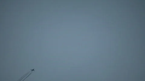 Condensation trails left behind from a passing airplane (High Definition) Stock Footage 67971