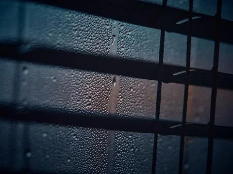 Condensation on Window with Dark Blinds Stock Photos