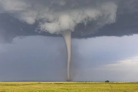 A Condensed Tornado, a rotating column of air reaching to the ground, a def.. Stock Photos