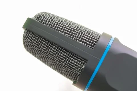 Condenser microphone head on a light background Foto stock