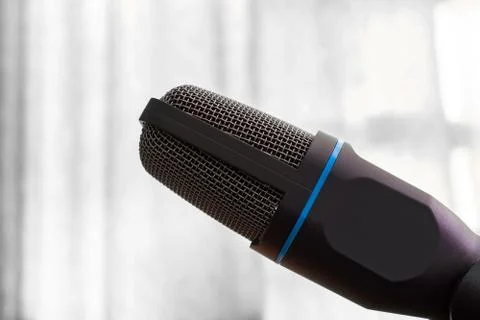 Condenser microphone head on a light background Stock Photos