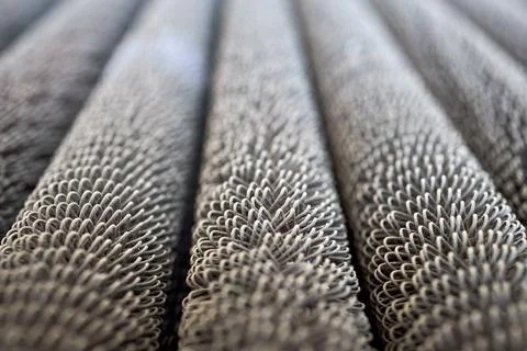 Condensing unit aluminium close up wire finned obsolete tubes grill perspective Stock Photos