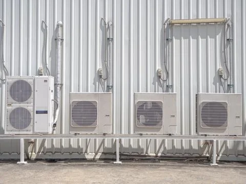 Condensing units for ceiling air conditioner,placed on steel frame,sunlight Stock Photos