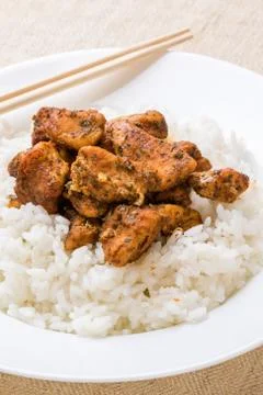 Condimented chicken with rice Stock Photos