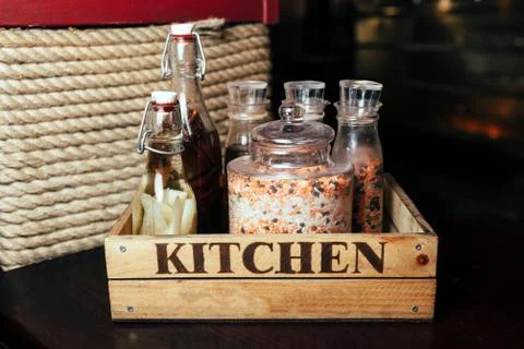 Condiments in cans in a box Foto stock