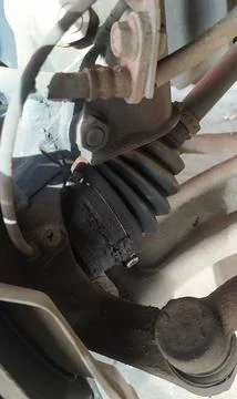 The condition of the axle boot of a car Stock Photos