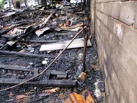 A condition of a building that has been completely burnt by fire Stock Photos