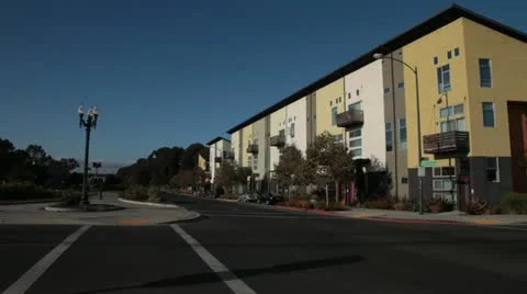 Condo complex wide - pan to sky Stock Footage 11239095