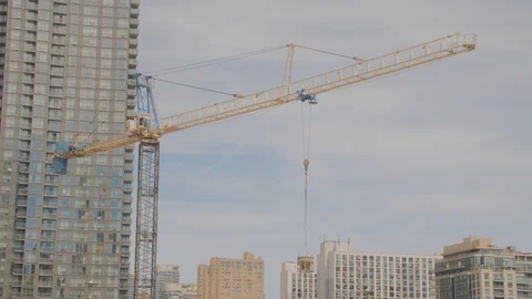 Condo Construction Development Building Tower Crane Carrying Load Sky Backgro 스톡 동영상 92319519
