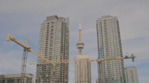Condo Construction Development Building Tower Cranes CN Tower Closeup Stock Footage 92319583