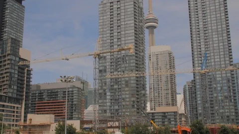 Condo Construction Development Building Tower Cranes CN Tower Pan Up 2 Stock Footage 92319621
