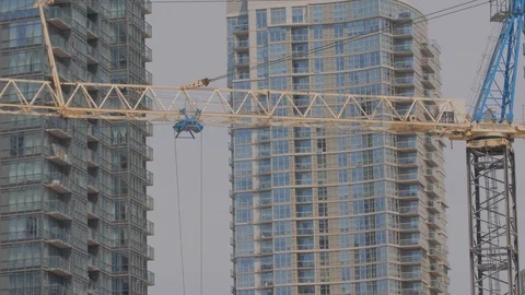 Condo Construction Development Tower Crane Building Medium Rotating Video stock 92186670