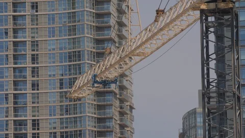 Condo Construction Development Tower Crane Building Condo Background Closeup Video stock 92186684