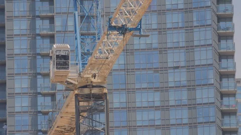 Condo Construction Development Tower Crane Building Closeup Rotating Video stock 92186702