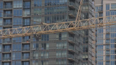 Condo Construction Development Tower Crane Building Boom Arms Closeup Vídeos de archivo 92186738