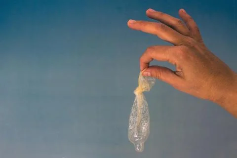 The condom is knotted. Stock Photos