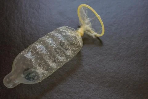 The condom is knotted. Stock Photos