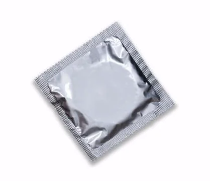 Condom package isolated on white background Stock Photos
