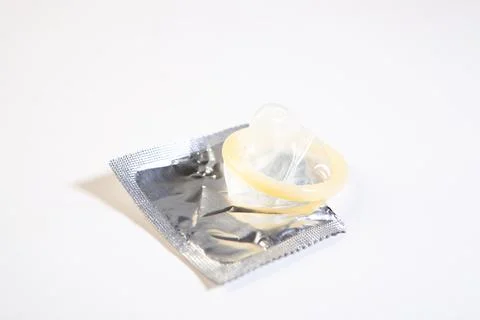 Condom on the table Stock Photos