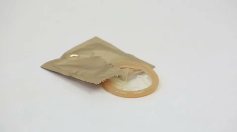Condom on white background Stock Footage 58595746