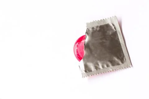 Condom on white background Stock Photos